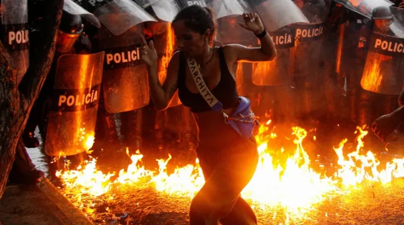 A photo of protesters facing off with police in Caracas or a graphic illustrating the turmoil.